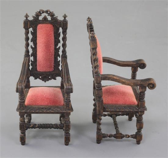 Denis Hillman. A pair of Victorian style Carolean design miniature oak elbow chairs, height 4in.